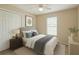 Bedroom featuring a cozy bed, window with blinds, and closet at 1 Pecan Course Cir, Ocala, FL 34472