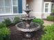 Exterior view of fountain surrounded by manicured landscaping at 19811 Lake Dorr Rd, Altoona, FL 32702