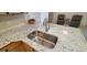 Modern kitchen features a stainless steel sink and granite countertops at 1524 New Jersey Oaks Ct, Lakeland, FL 33801