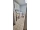 Bright laundry room with white cabinets and a utility sink at 1524 New Jersey Oaks Ct, Lakeland, FL 33801