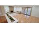 Bright living room offers fireplace and large windows allowing natural light at 1524 New Jersey Oaks Ct, Lakeland, FL 33801