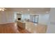 Spacious living room with fireplace and hardwood floors throughout at 1524 New Jersey Oaks Ct, Lakeland, FL 33801