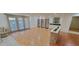 Beautiful living room with access to the outdoors and hardwood floors at 1524 New Jersey Oaks Ct, Lakeland, FL 33801