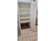 A built-in pantry with multiple shelves, ready to store lots of food and supplies at 1524 New Jersey Oaks Ct, Lakeland, FL 33801