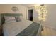 Comfortable bedroom featuring coastal decor and inviting atmosphere, perfect for relaxation and a restful stay at 3100 Ocean Shore Blvd # 101, Ormond Beach, FL 32176