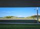 Breathtaking ocean view with clear blue skies and lush greenery at 3100 Ocean Shore Blvd # 101, Ormond Beach, FL 32176