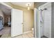 Bathroom with a tile shower and view of the bedroom at 4346 Thomas Wood Ln E, Winter Haven, FL 33880