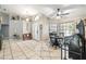 Welcoming foyer with tile flooring, a bench, and elegant decor sets a charming tone for this beautiful home at 4346 Thomas Wood Ln E, Winter Haven, FL 33880