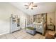 Comfortable main bedroom featuring a four-poster bed and neutral tones at 4346 Thomas Wood Ln E, Winter Haven, FL 33880
