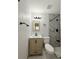 Updated bathroom showcasing modern vanity, and sleek marble tile shower at 635 Mccormick St, Daytona Beach, FL 32114