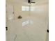 Spacious bedroom with marble floors, door to hall and natural light from multiple windows at 635 Mccormick St, Daytona Beach, FL 32114