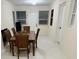 Bright dining space featuring a wood dining table with seating at 635 Mccormick St, Daytona Beach, FL 32114