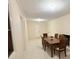 Cozy dining area with a classic wood dining table at 635 Mccormick St, Daytona Beach, FL 32114