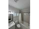 Bathroom features tiled walls, a shower with glass doors, and a modern vanity at 1105 Chichester St, Orlando, FL 32803