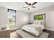 Bedroom with a window view and a ceiling fan at 1105 Chichester St, Orlando, FL 32803