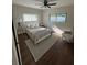 Cozy bedroom features lots of natural light, a comfortable bed, stylish decor, and a relaxing atmosphere at 1105 Chichester St, Orlando, FL 32803