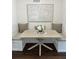 Cozy dining area with bench seating, neutral tones, and decorative artwork at 1105 Chichester St, Orlando, FL 32803