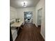 Bright dining area features a custom built in bench table and views into the living room at 1105 Chichester St, Orlando, FL 32803