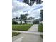 Charming home featuring a well-manicured lawn and a covered carport at 1105 Chichester St, Orlando, FL 32803