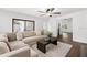 Comfortable living room featuring a cozy sectional sofa and stylish decor at 1105 Chichester St, Orlando, FL 32803