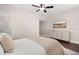 Main bedroom featuring a modern ceiling fan and large TV at 1105 Chichester St, Orlando, FL 32803