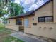 Charming townhome featuring a private entrance and well-kept surroundings at 56 Pine Trak # 101E, Ocala, FL 34472