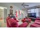 Warm and inviting living room with comfortable furniture and plenty of natural light at 56 Pine Trak # 101E, Ocala, FL 34472