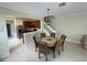 The dining area offers seamless flow between the kitchen and living spaces with natural light at 6059 Twain St # 108, Orlando, FL 32835