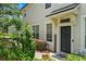 Charming home exterior with well-manicured landscaping and a welcoming entrance at 6059 Twain St # 108, Orlando, FL 32835