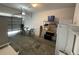 Spacious two-car garage with storage shelving and garage door at 6059 Twain St # 108, Orlando, FL 32835