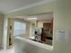 This kitchen is complete with stainless steel appliances, tile floor, and granite countertops at 6059 Twain St # 108, Orlando, FL 32835