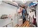 Organized walk-in closet with shelving and wood-look floors at 6059 Twain St # 108, Orlando, FL 32835