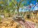 Spacious wooden deck with a dining area and seating, perfect for outdoor entertaining or relaxation at 70 N Oak Ave, Umatilla, FL 32784