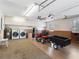 Spacious garage features laundry, storage, tractor, and access to the rest of the house at 994 Country Lake Cir, Lake Wales, FL 33898
