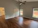 Bedroom with vaulted ceiling and hardwood floors at 1608 Fox Glen Ct, Winter Springs, FL 32708