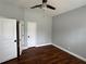 Bright bedroom with ceiling fan and luxury vinyl plank flooring at 1608 Fox Glen Ct, Winter Springs, FL 32708