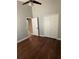 Spacious bedroom with ceiling fan and hardwood floors at 1608 Fox Glen Ct, Winter Springs, FL 32708
