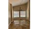 A view of the dining room with high ceilings and a chandelier at 1608 Fox Glen Ct, Winter Springs, FL 32708