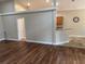 View of the living space highlighting the new floors and kitchen at 1608 Fox Glen Ct, Winter Springs, FL 32708