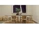 Bright dining room showcasing a large table with seating for six and unique decor at 4759 Waltham Forest Dr, Davenport, FL 33837