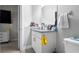 Bathroom featuring granite counters, ample storage, and modern fixtures at 8007 Sw 135Th Loop, Ocala, FL 34473