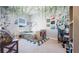 Spacious bedroom with neutral carpet, decorated walls, and window offering natural light at 8007 Sw 135Th Loop, Ocala, FL 34473