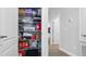 Organized storage closet full of supplies and household items at 8007 Sw 135Th Loop, Ocala, FL 34473