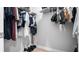 Well-organized walk-in closet with ample shelving and hanging space for clothes and accessories at 8007 Sw 135Th Loop, Ocala, FL 34473