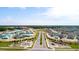 An aerial view of a new home community under construction, with homes in progress and neat street layouts at 2115 Forage Dr, Kissimmee, FL 34746