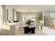 Open-concept living area with a comfortable sofa, modern decor, and seamless flow to the kitchen at 2157 Albatross Nest Dr, Bartow, FL 33830