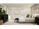 Comfortable primary bedroom with a king bed, accent pillows, dark wood accents, and natural light at 2157 Albatross Nest Dr, Bartow, FL 33830