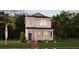 Inviting two-story home features a charming front porch, landscaped yard, and a welcoming blue front door at 2433 Spring Tune Aly, Kissimmee, FL 34744