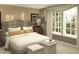 Comfortable bedroom with a large window, neutral tones, and soft lighting, creating a relaxing atmosphere at 2433 Spring Tune Aly, Kissimmee, FL 34744