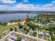 Aerial view of neighborhood, showing proximity to lake and a vibrant residential area, promoting its location and appeal at 800 W Lake Elbert Ne Dr, Winter Haven, FL 33881